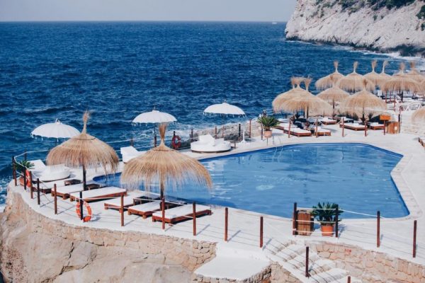one of the oldest beach clubs in Mallorca overlooking the sea.